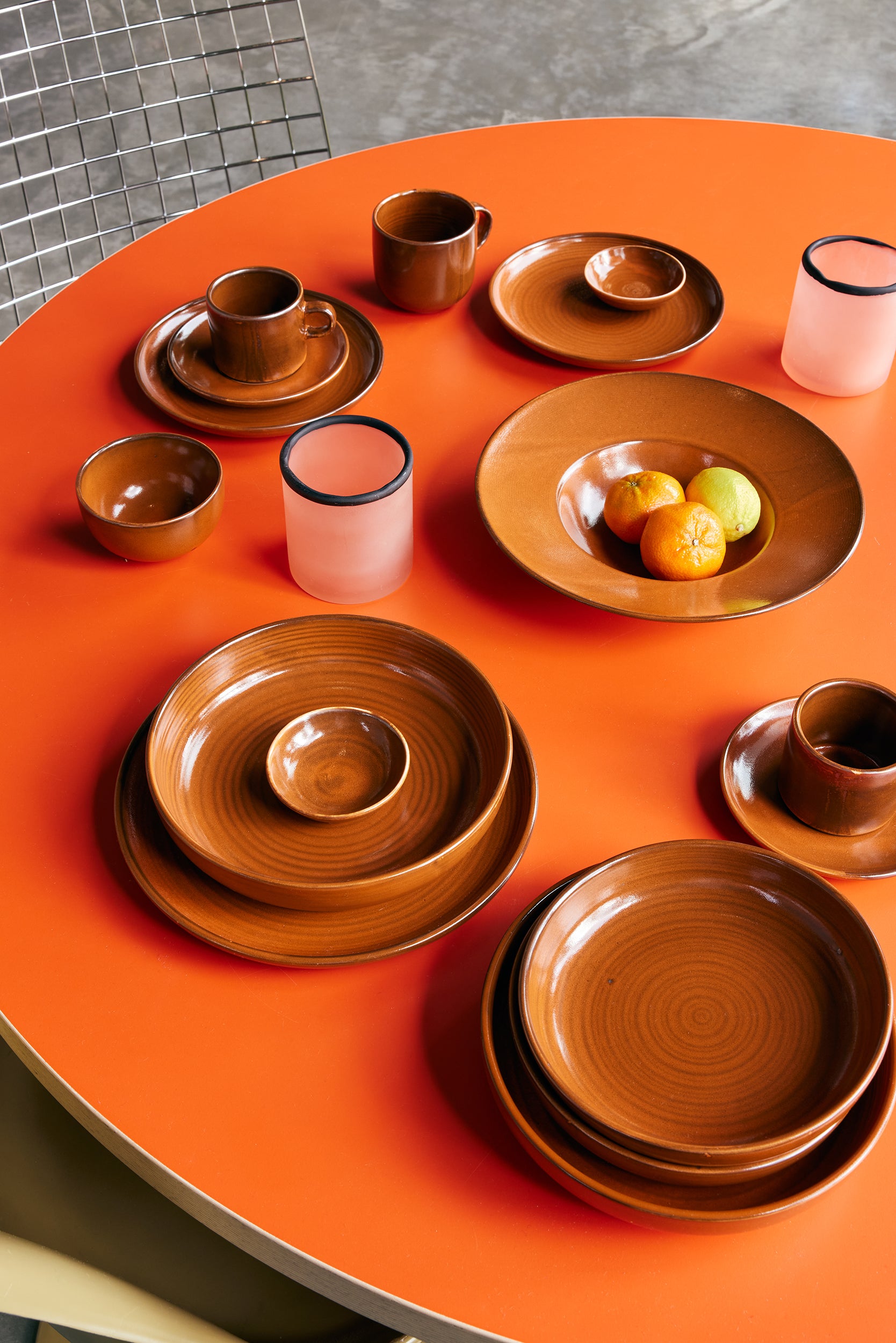 HKLIVING CUP AND SAUCER : BURNED ORANGE